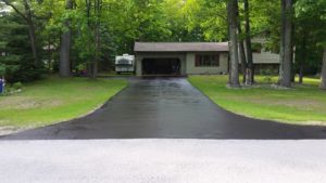 Long driveway with sealcoating